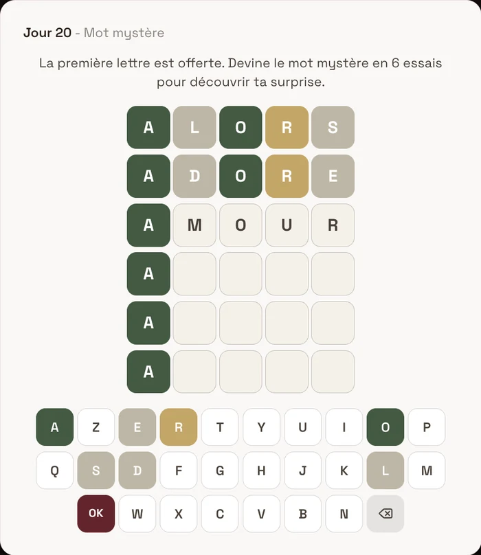 Jeu du mot mystère dans un calendrier de l'Avent Lovent, grille de lettres colorées où le mot AMOUR a été deviné, avec le clavier de saisie.